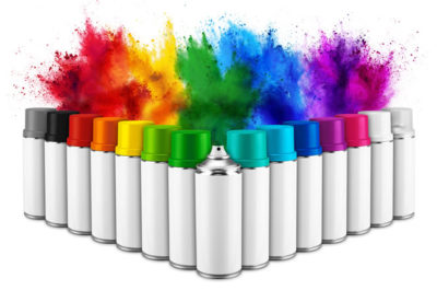 row of many spray can in colorful color in front of ainbow holi paint color powder explosion isolated white background. Industry diy paintjob graffiti concept.