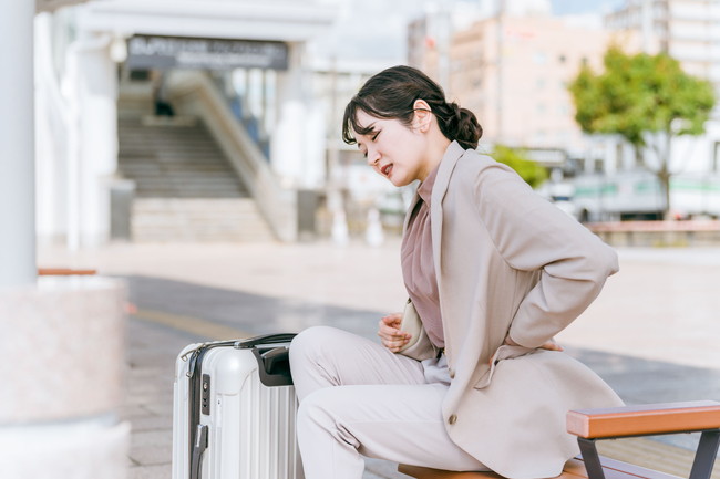 旅先　旅行先　不調　女性